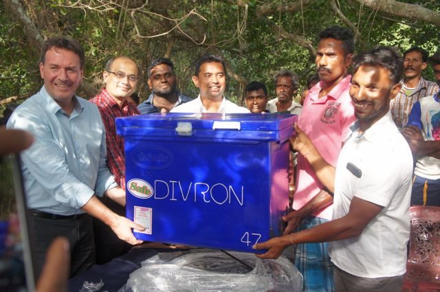 Divron team with a fishery society